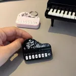 Mini-llavero-de-teclado-electr-nico-instrumento-Musical-port-til-juguete-de-Piano-llavero-de-Piano-3.webp